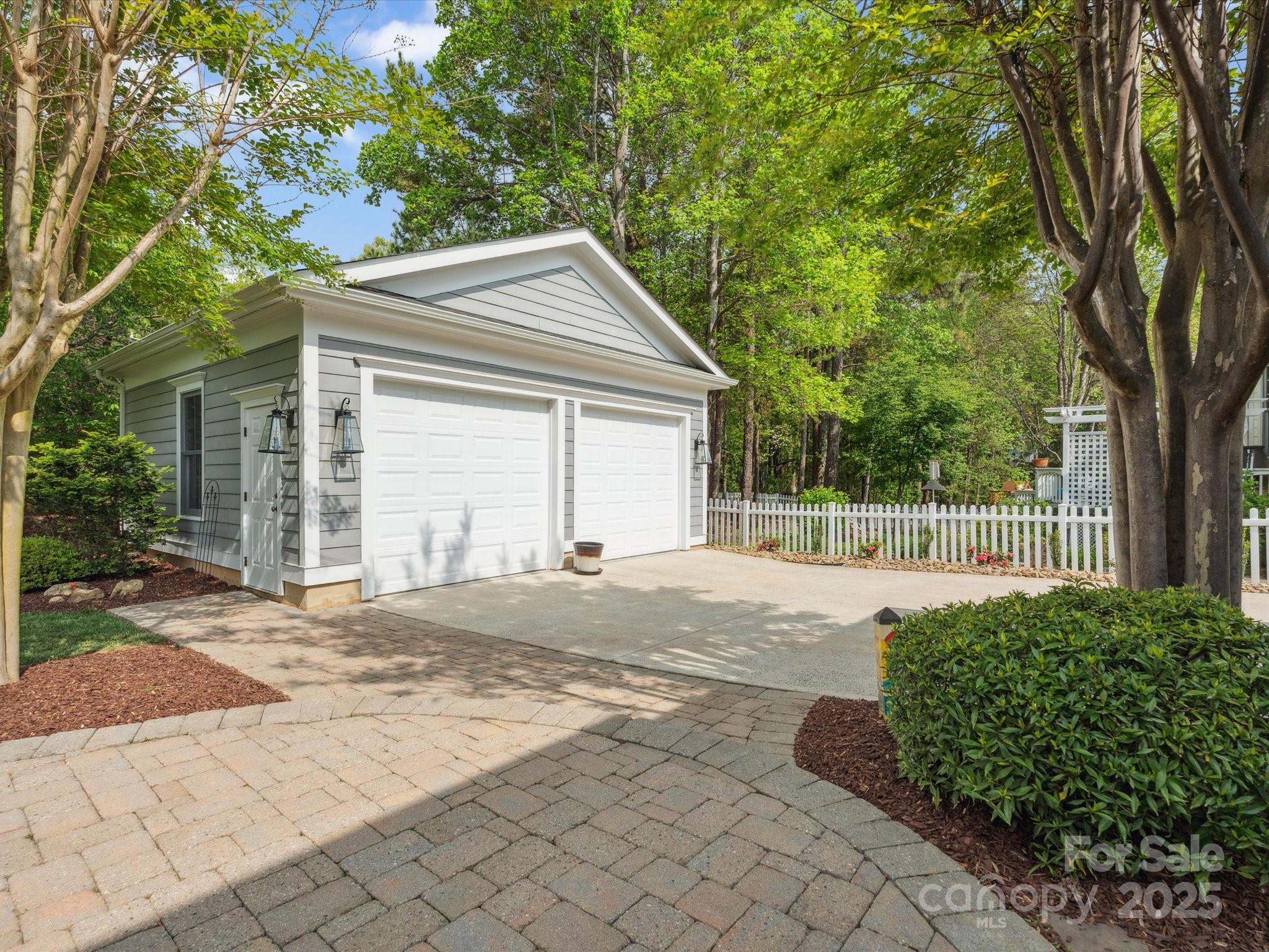 894 Stratford Run Drive Fort Mill, SC 29708 - Photo 34 of 45 a front view of a house with a yard and garage