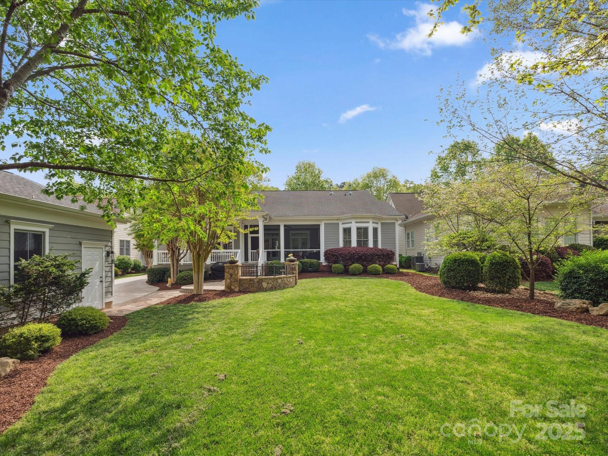 894 Stratford Run Drive Fort Mill, SC 29708 - Photo 38 of 45 a view of a house with a yard porch and sitting area
