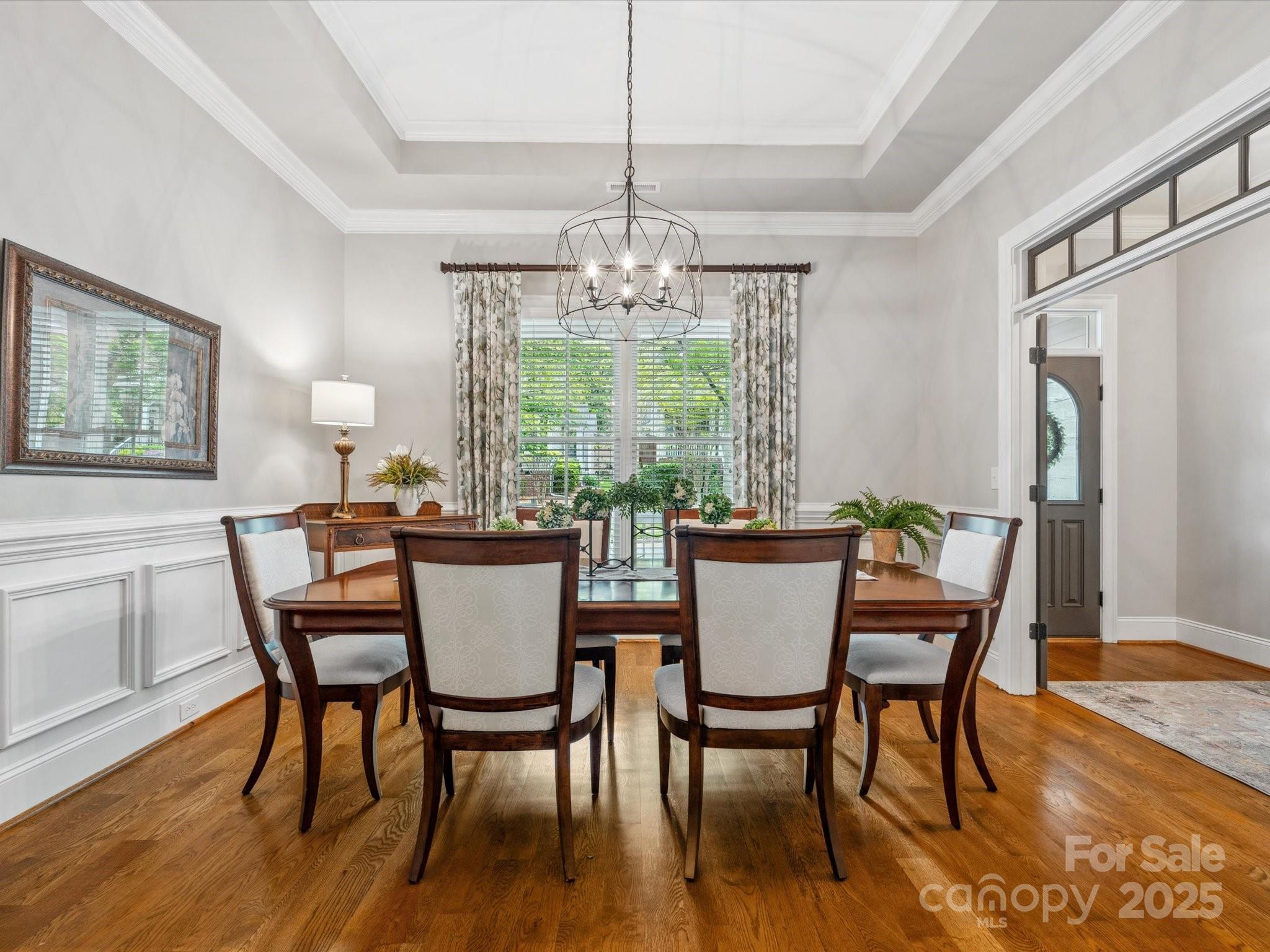 894 Stratford Run Drive Fort Mill, SC 29708 - Photo 5 of 45 a view of a dining room with furniture window and wooden floor