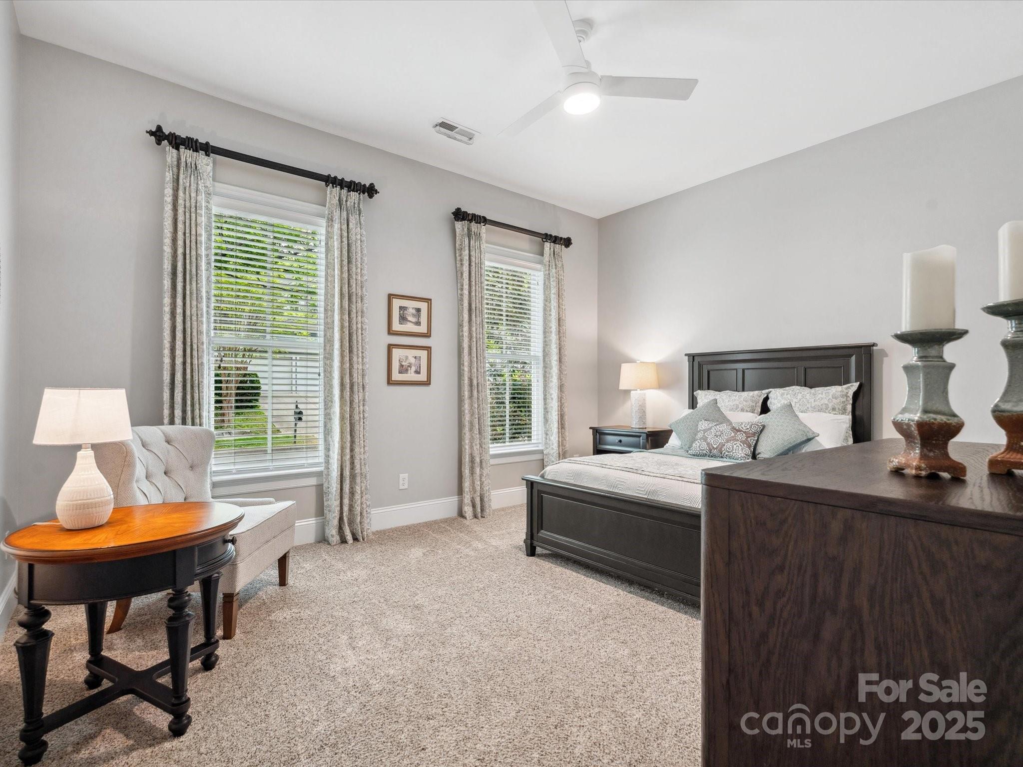 894 Stratford Run Drive Fort Mill, SC 29708 - Photo 6 of 45 a bedroom with furniture and a window