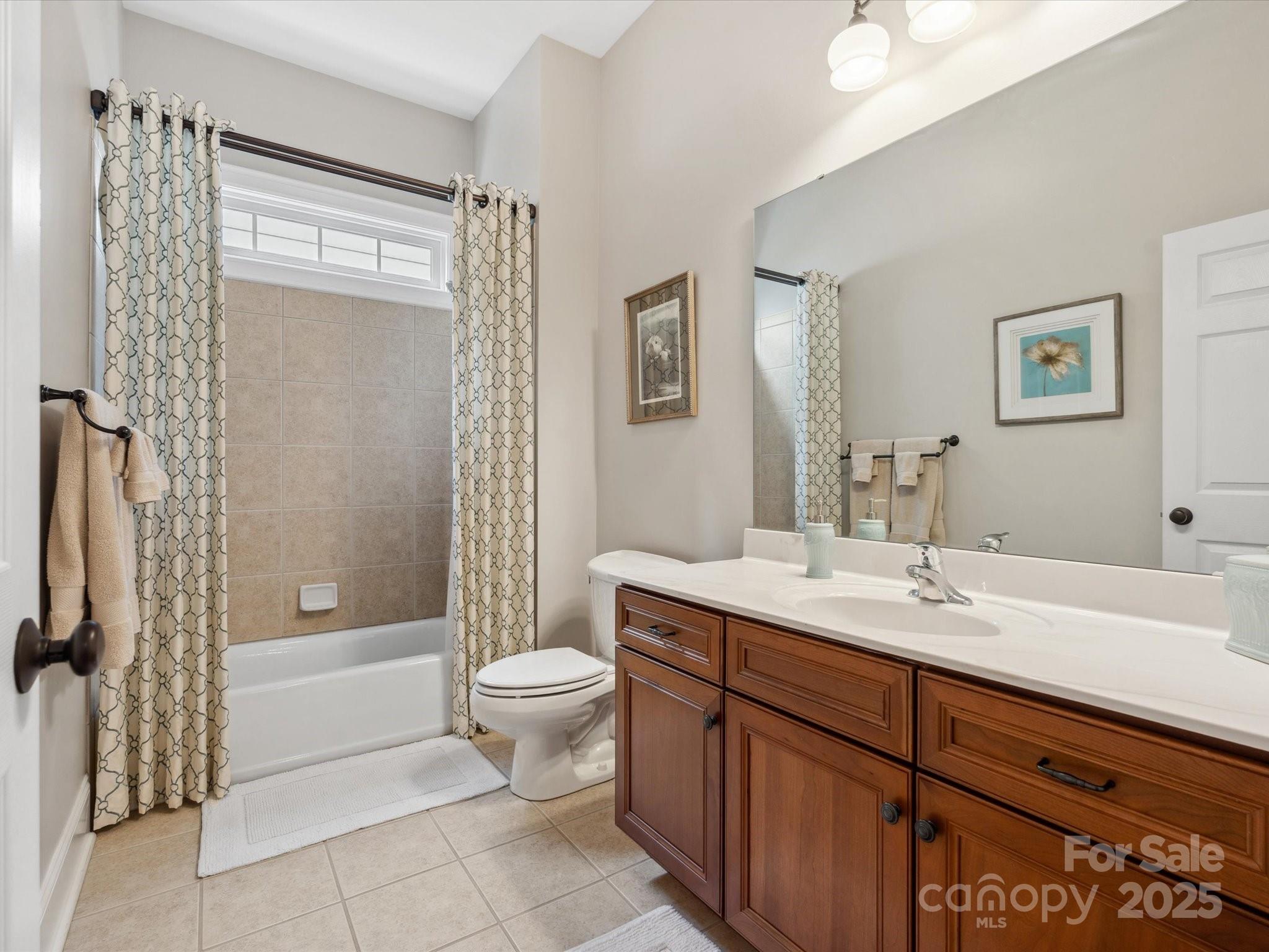 894 Stratford Run Drive Fort Mill, SC 29708 - Photo 7 of 45 a bathroom with a granite countertop sink toilet and shower