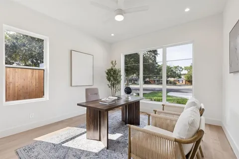 a view of a livingroom with furniture and window