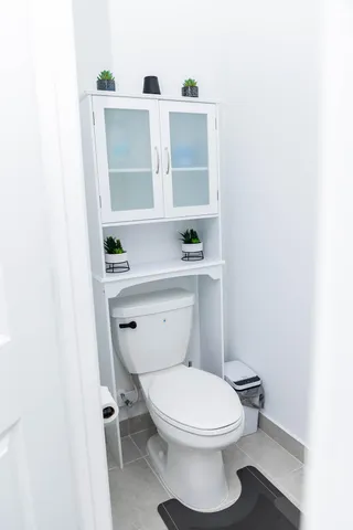 a bathroom with a toilet and a sink