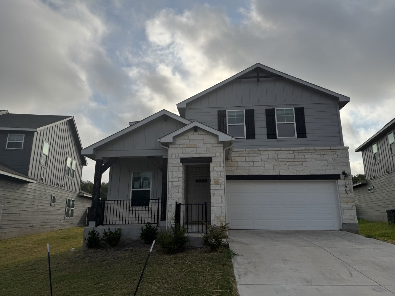 11509 Copperstone Avenue, Unit 92 Austin, TX 78748 - Photo 1 of 11 a front view of a house with garage