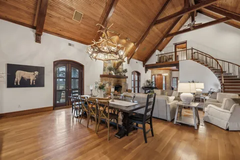 a front view of a house with outdoor seating