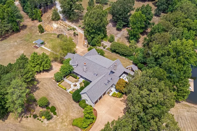a view of a porch with wooden floor and fence