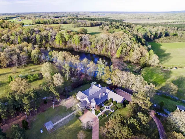 a view of outdoor space with wooden fence