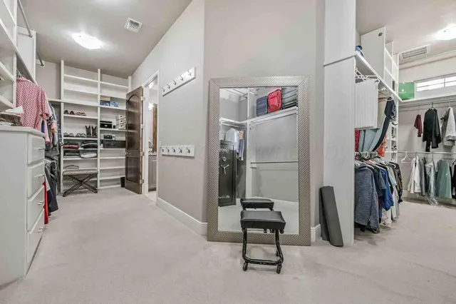 a view of empty room with closet