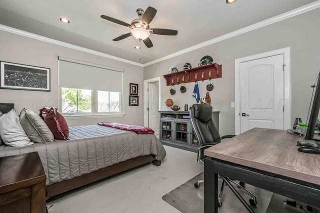 a bedroom with a bed and a table