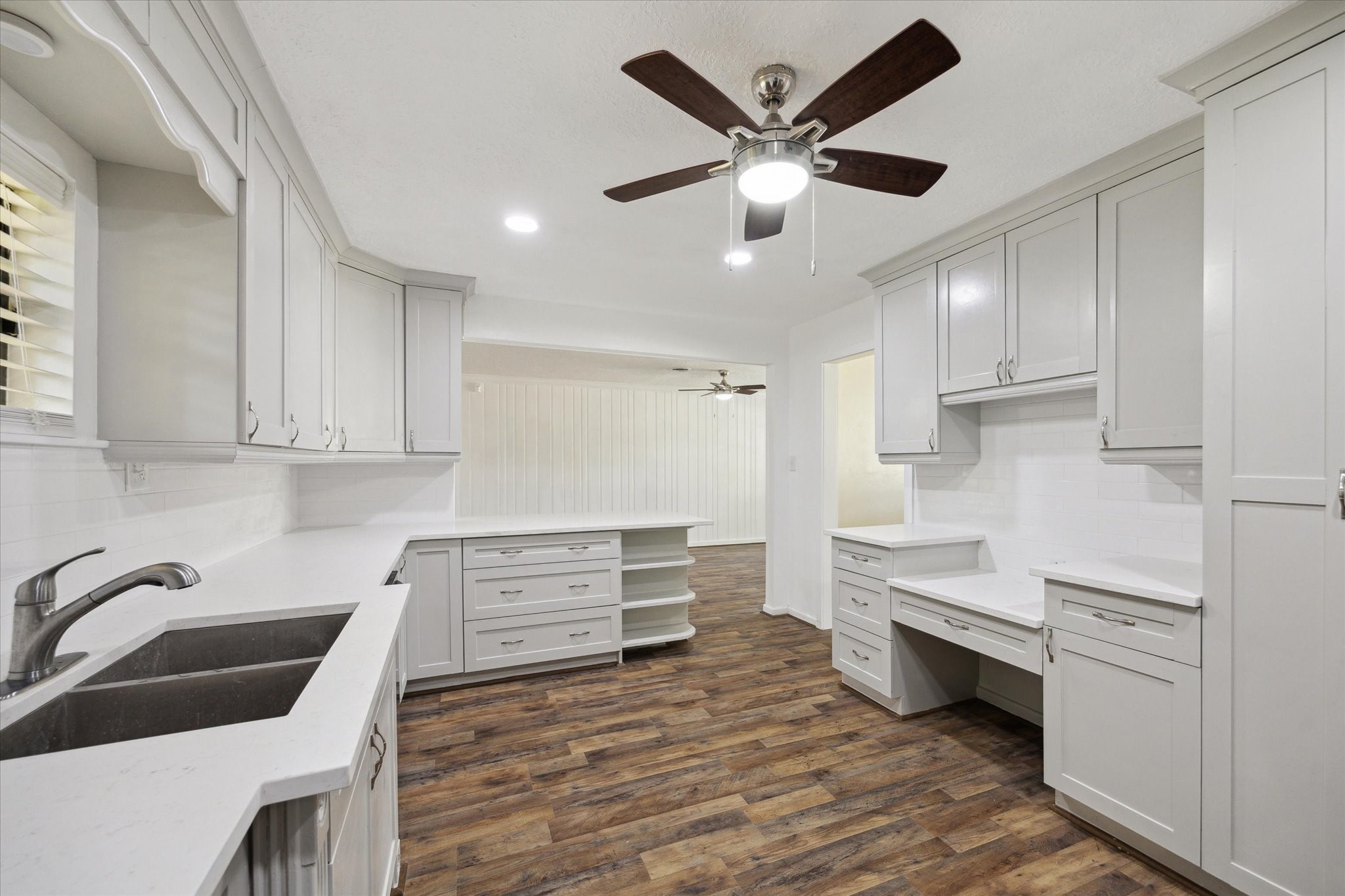 1309 Centennial Drive Houston, TX 77055 - Photo 12 of 33 a kitchen with granite countertop a sink stainless steel appliances and cabinets