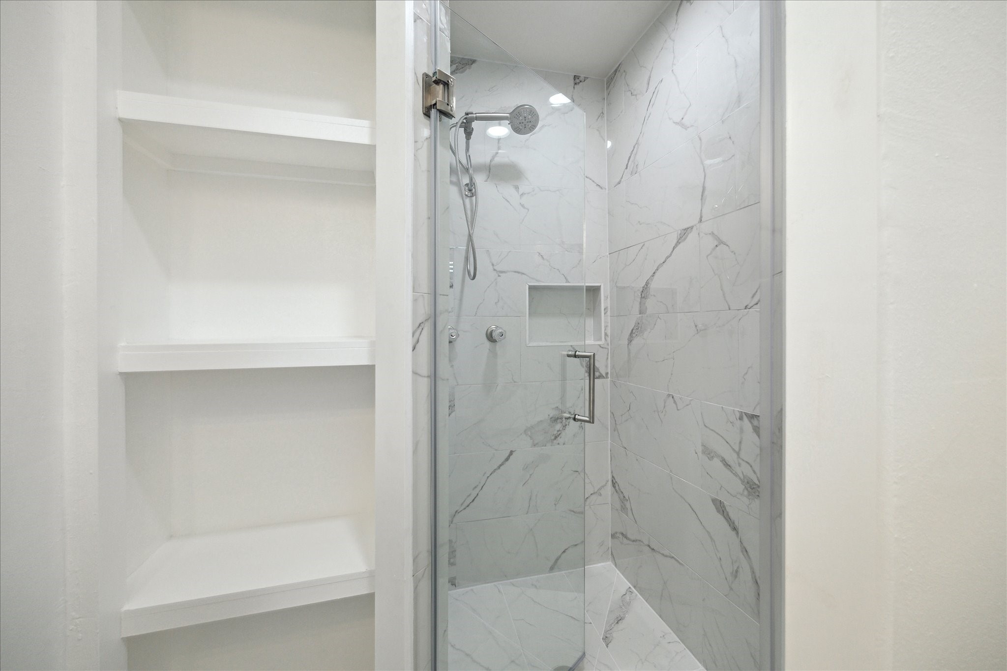 1309 Centennial Drive Houston, TX 77055 - Photo 16 of 33 a bathroom with a shower