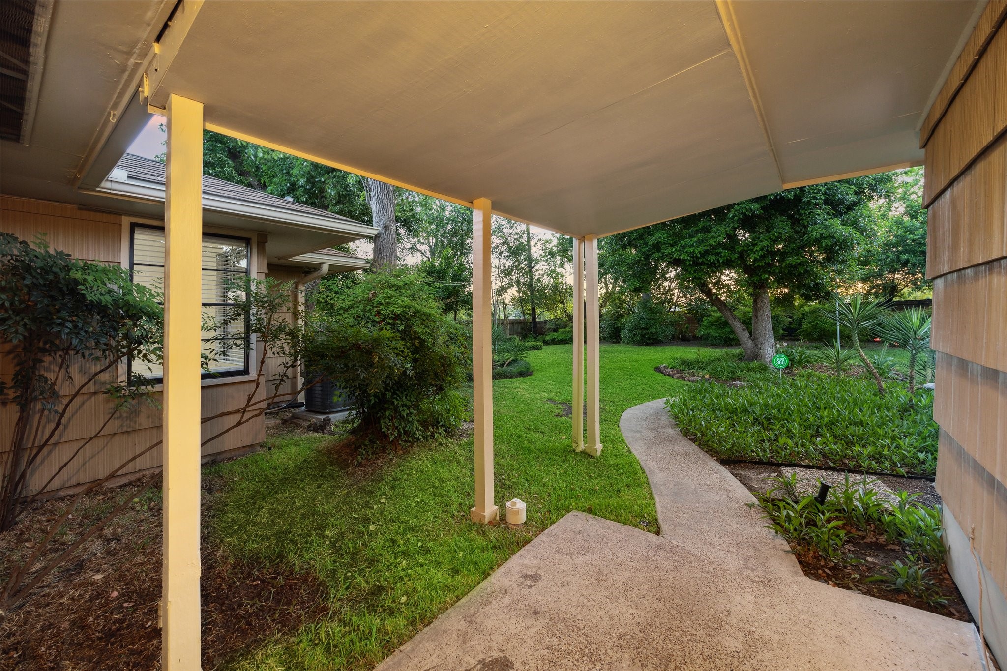 1309 Centennial Drive Houston, TX 77055 - Photo 25 of 33 a view of a porch with furniture and garden