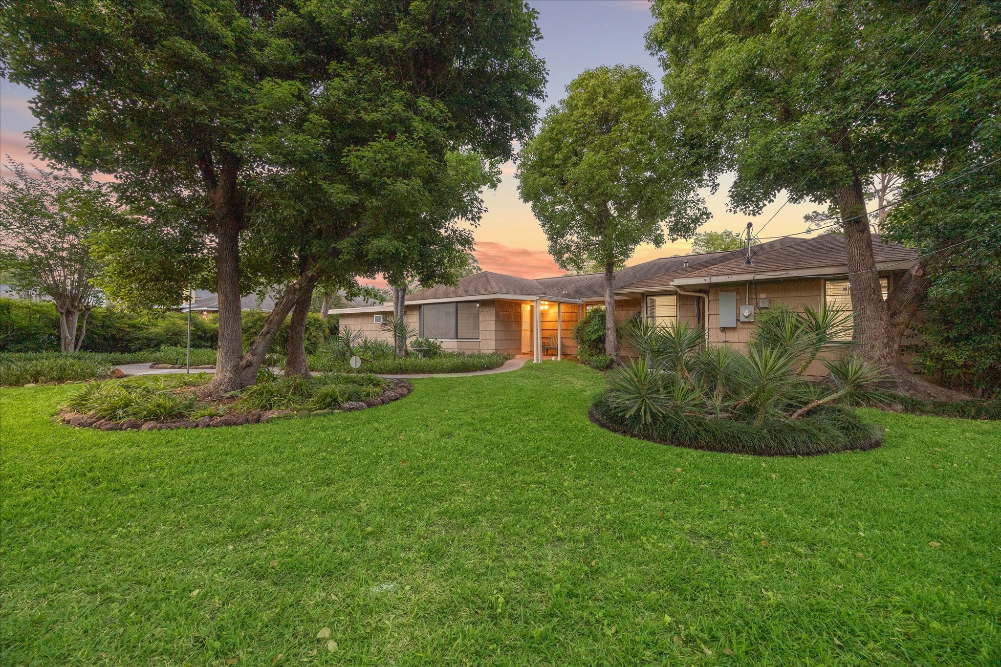 1309 Centennial Drive Houston, TX 77055 - Photo 32 of 33 a view of a house with a backyard and a tree