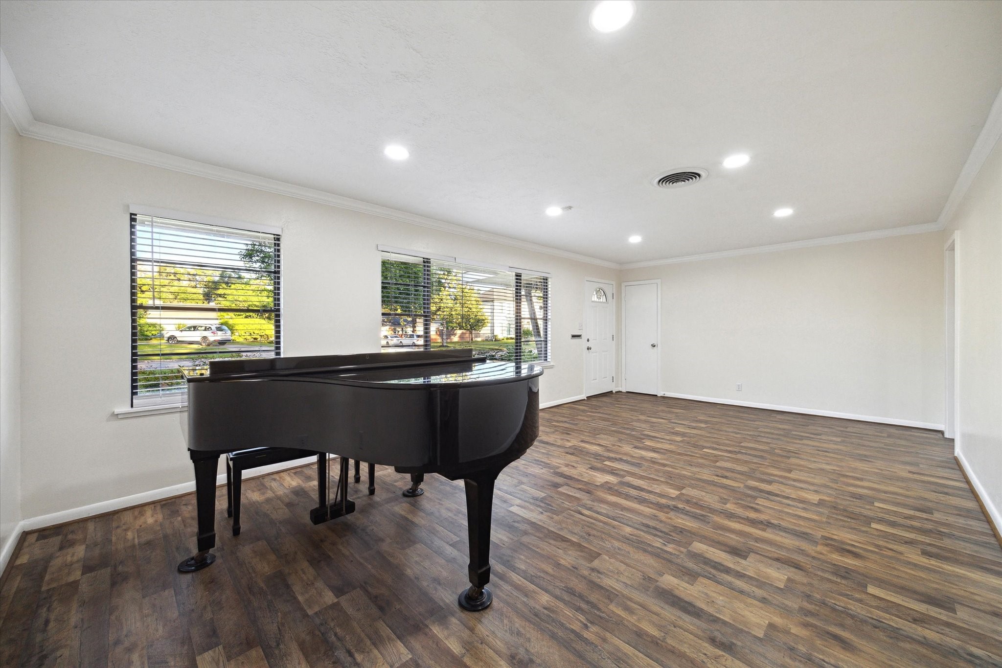 1309 Centennial Drive Houston, TX 77055 - Photo 7 of 33 a living room with a couch and a wooden floor