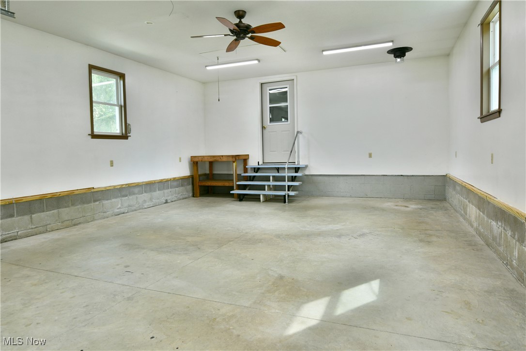 5150 Phillips Rice Road Cortland, OH 44410 - Photo 45 of 50 Garage featuring ceiling fan