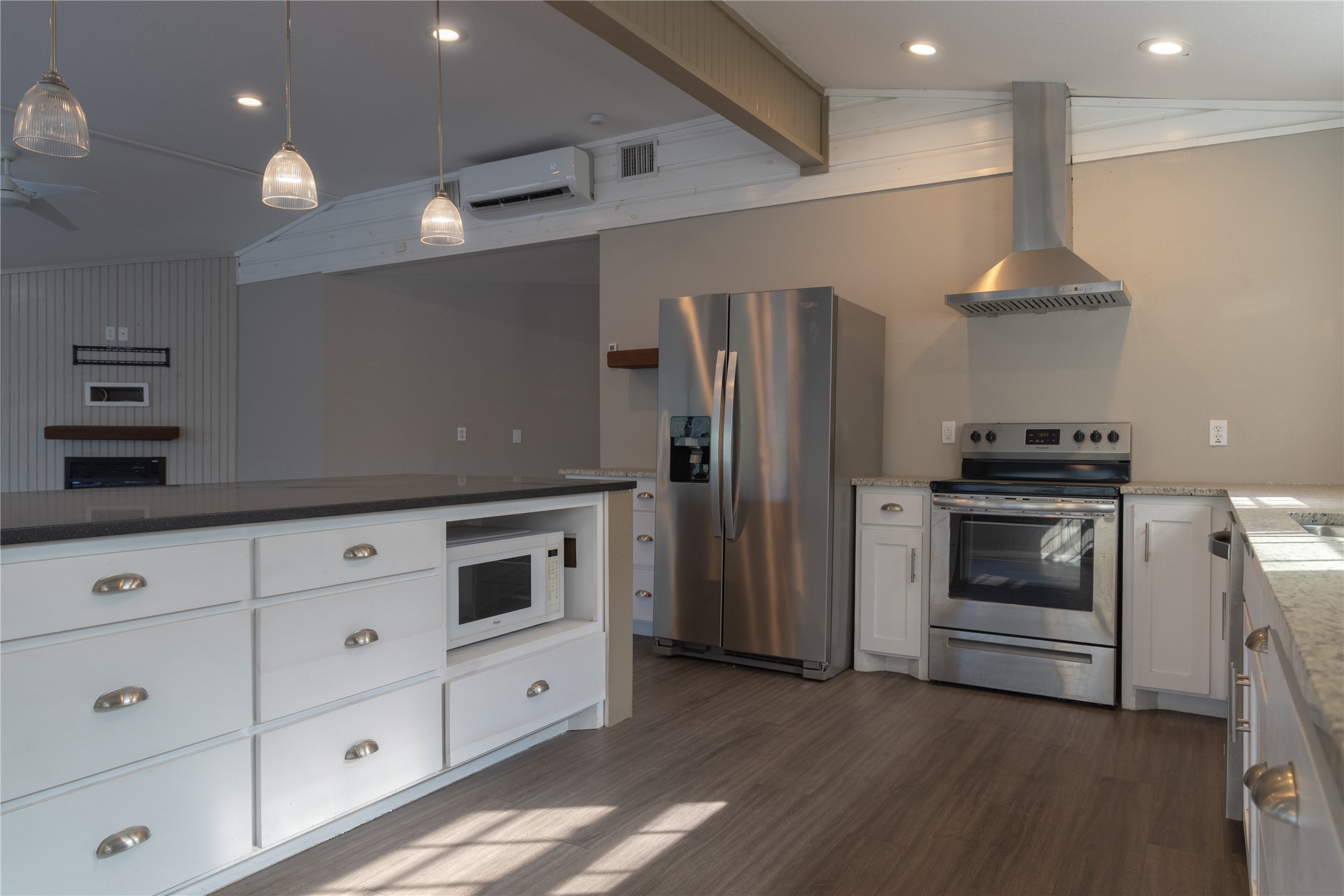 120 Erskine Ferry Road Seguin, TX 78155 - Photo 4 of 26 a kitchen with granite countertop a refrigerator and a stove