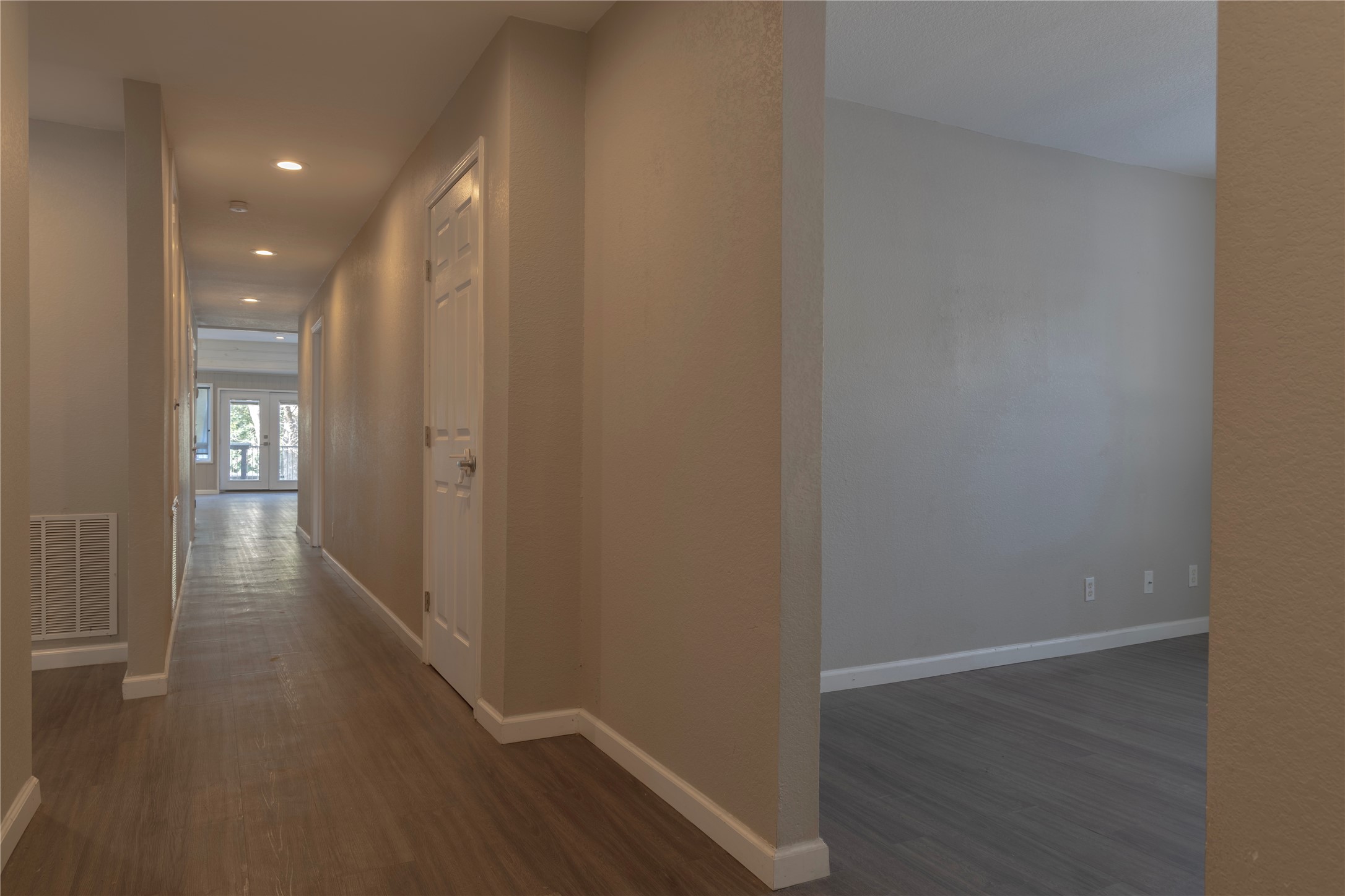 120 Erskine Ferry Road Seguin, TX 78155 - Photo 6 of 26 a view of a hallway with wooden floor