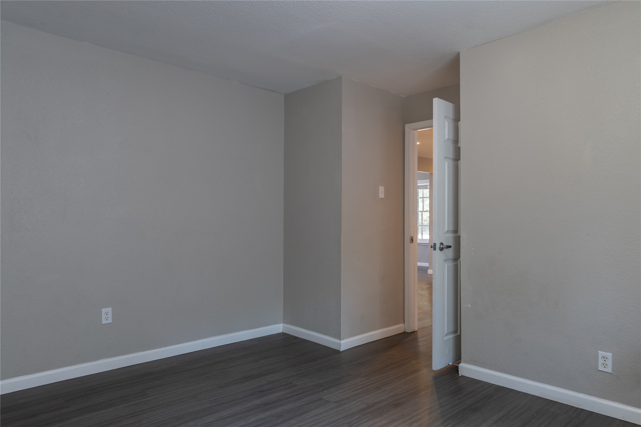 120 Erskine Ferry Road Seguin, TX 78155 - Photo 10 of 26 a view of an empty room with wooden floor