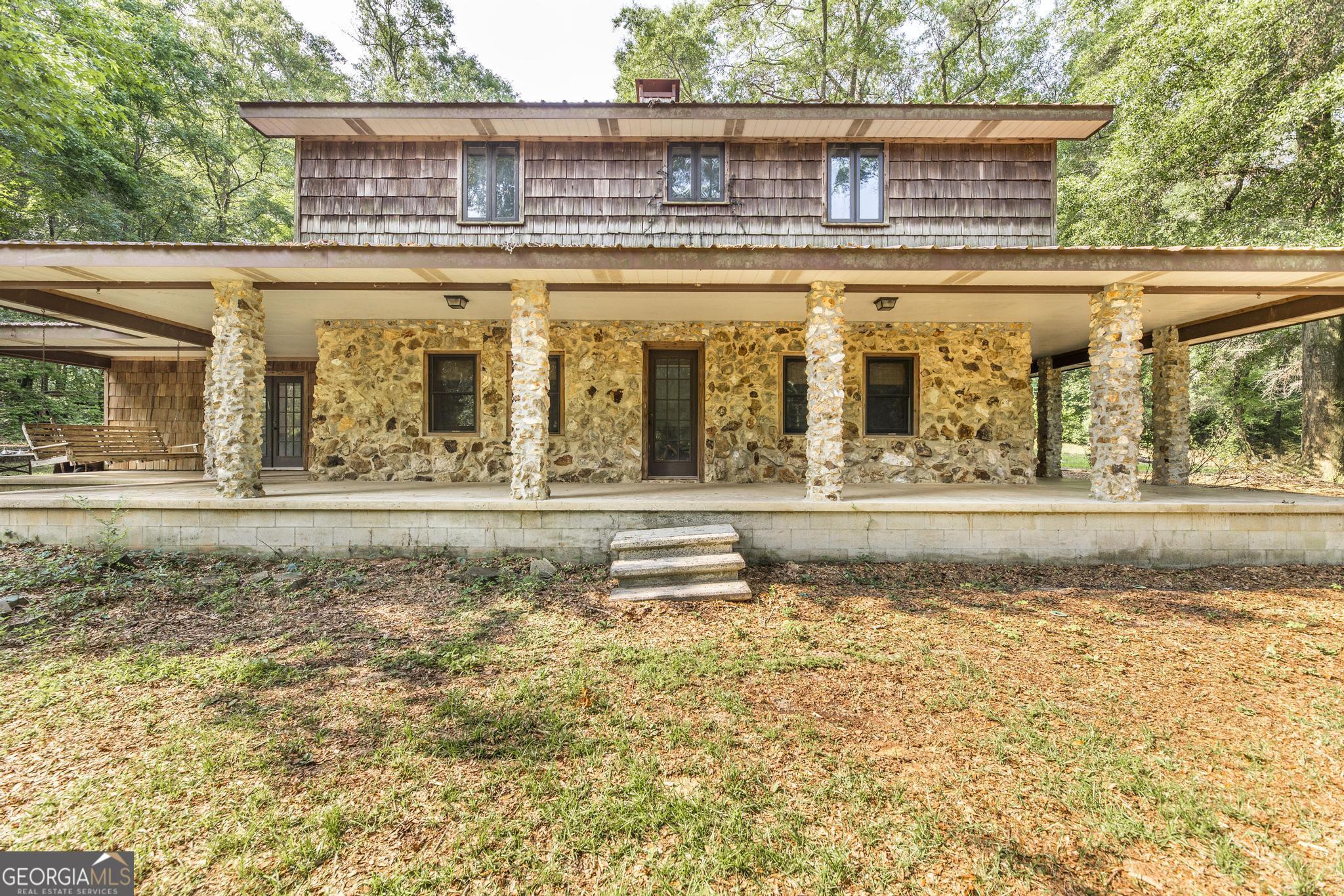 3222 Highway 80 Dublin, GA 31021 - Photo 2 of 49 a view of swimming pool with outdoor seating