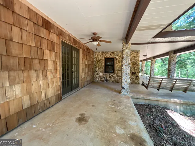 a view of lobby with furniture and a large window