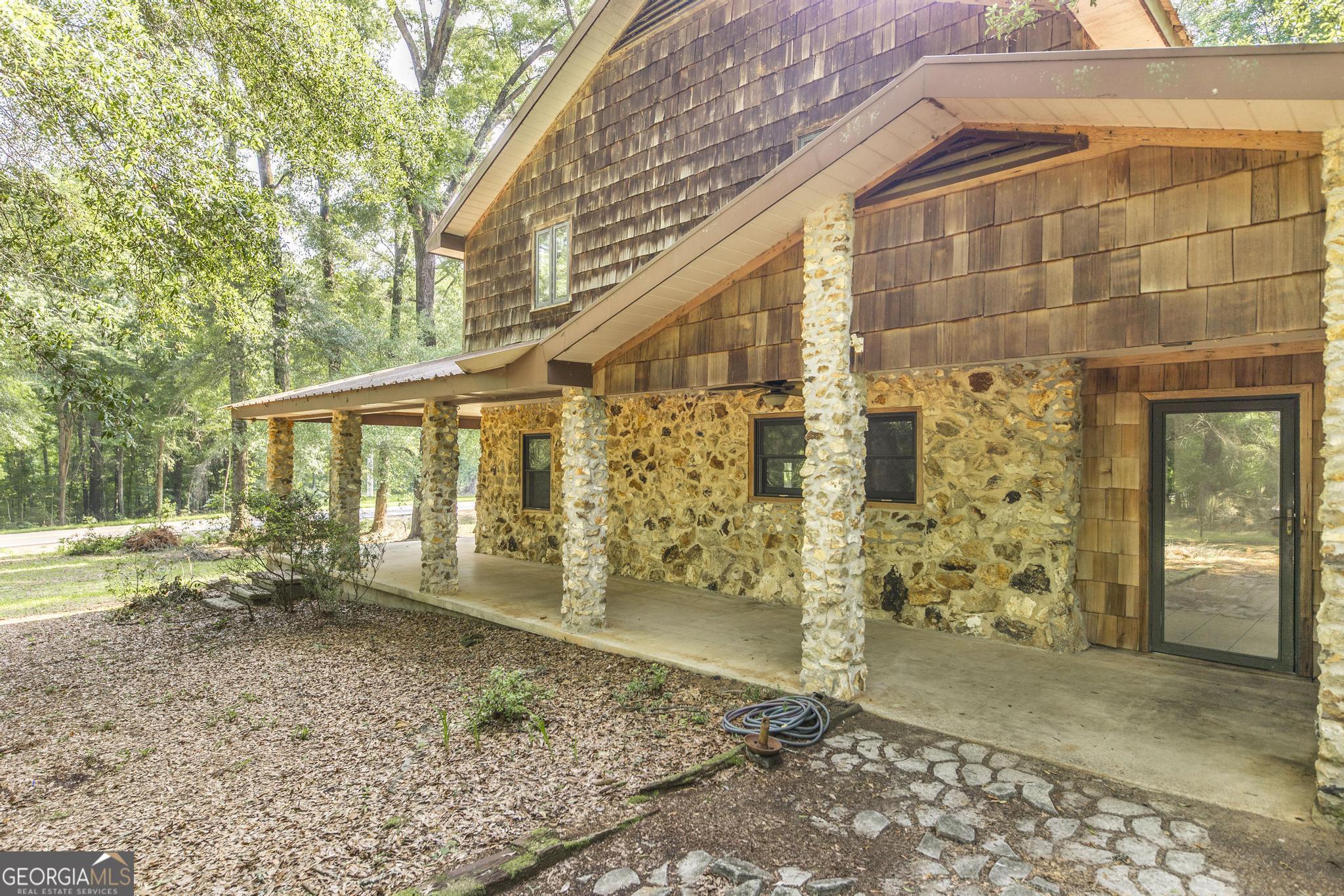3222 Highway 80 Dublin, GA 31021 - Photo 3 of 49 a view of a house with a yard