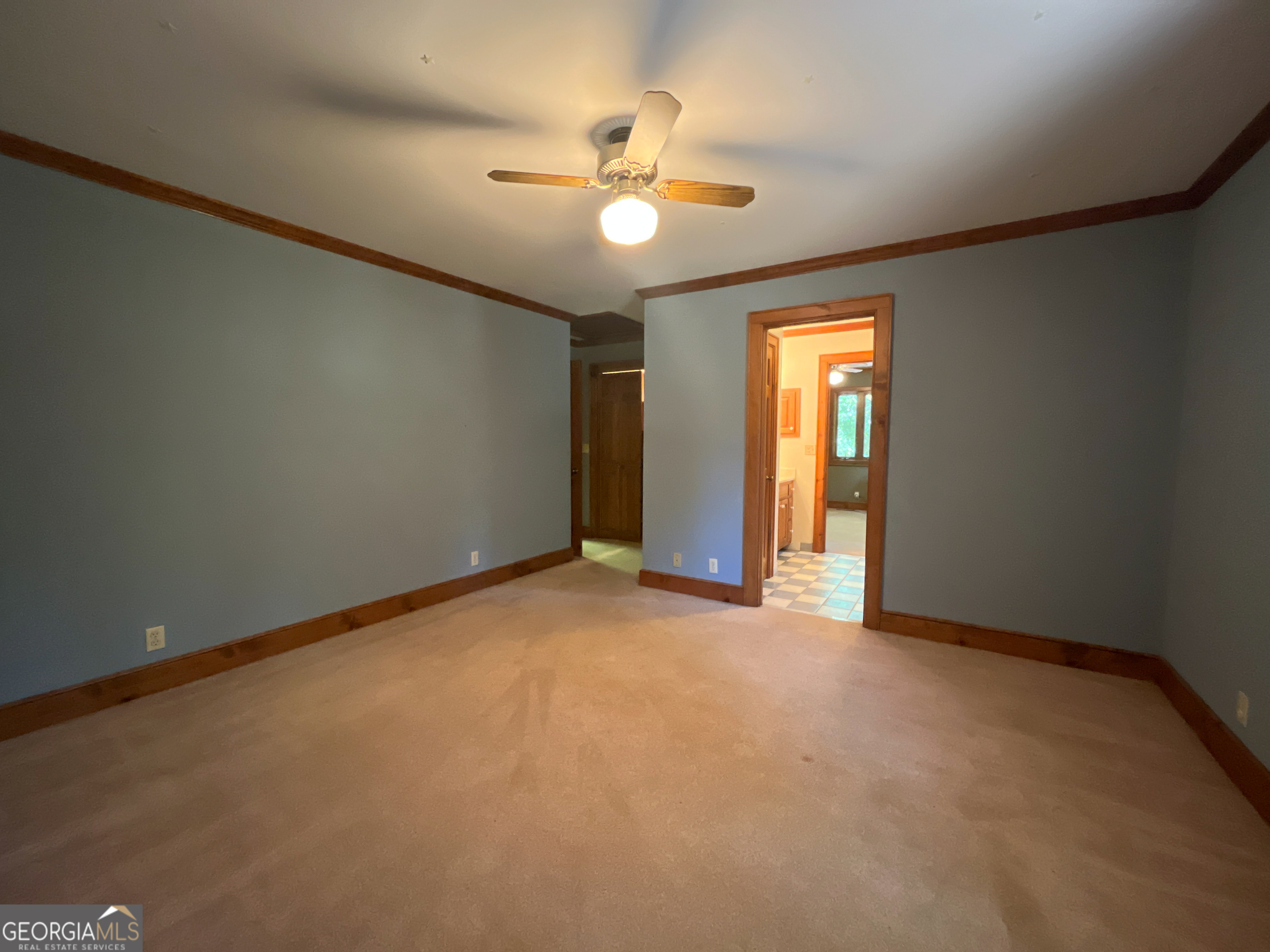 3222 Highway 80 Dublin, GA 31021 - Photo 33 of 49 an empty room with windows and fan