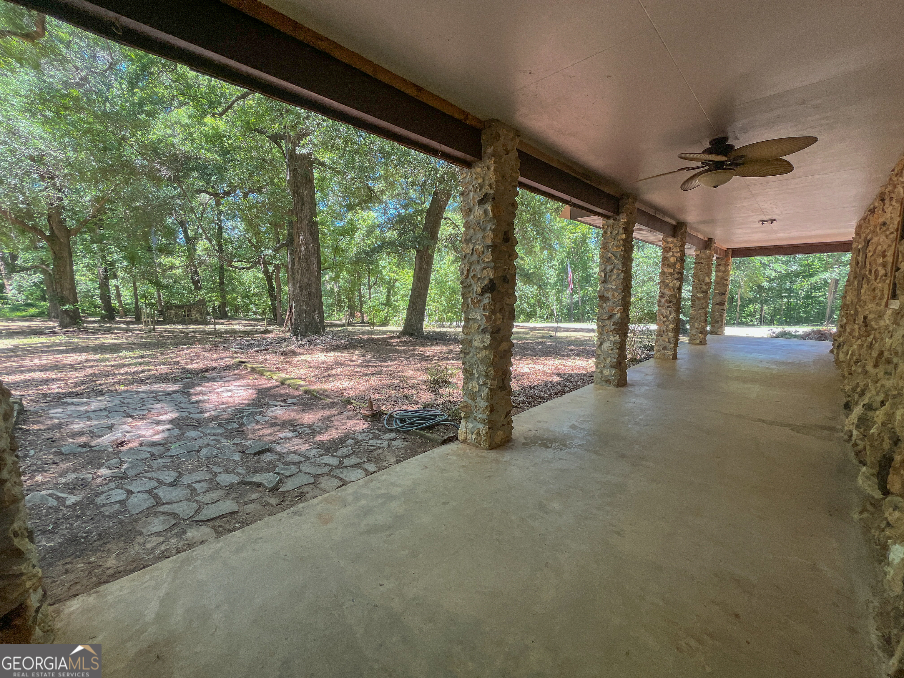3222 Highway 80 Dublin, GA 31021 - Photo 37 of 49 a view of a house with porch and a yard