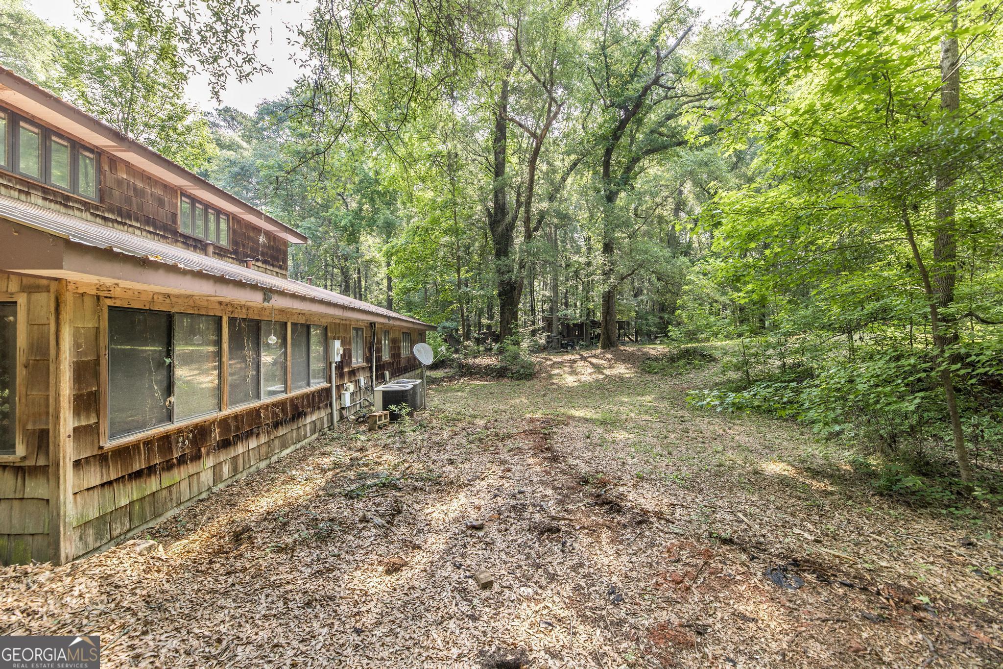 3222 Highway 80 Dublin, GA 31021 - Photo 41 of 49 a view of a house with a yard