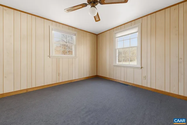 a room with gym equipment and a window