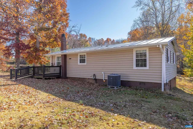 a view of a two room next to a large window