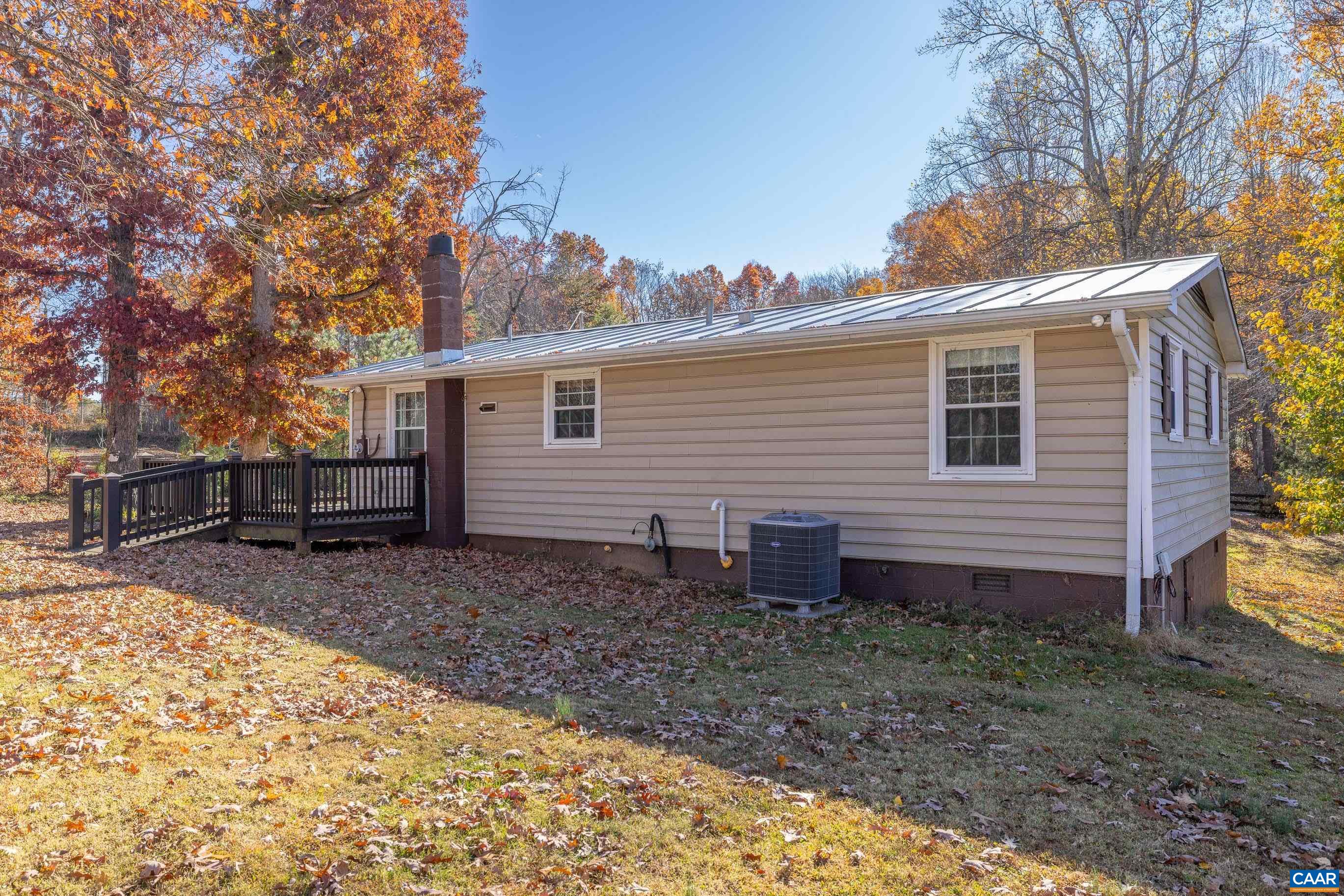 3590 Green Creek Road Schuyler, VA 22969 - Photo 18 of 25 a view of a house with backyard and trees