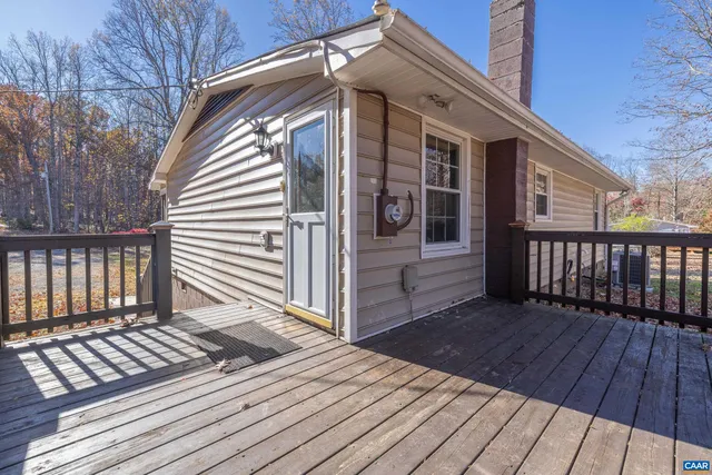 a view of a wooden roof deck