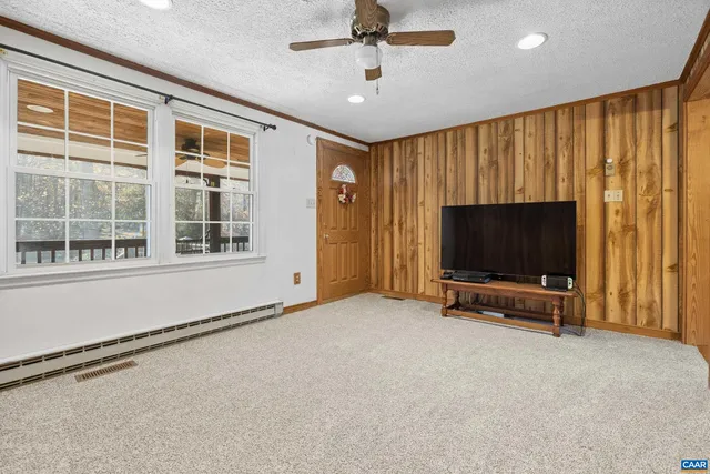 a view of a kitchen with a stove cabinets and wooden floor