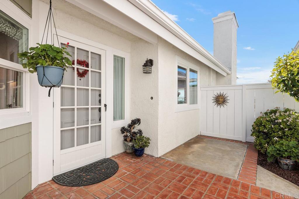 6833 Watercourse Drive Carlsbad, CA 92011 - Photo 13 of 49 a view of a entryway of a house