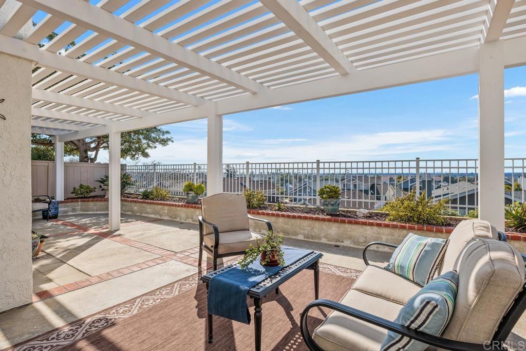 6833 Watercourse Drive Carlsbad, CA 92011 - Photo 21 of 49 a living room with furniture