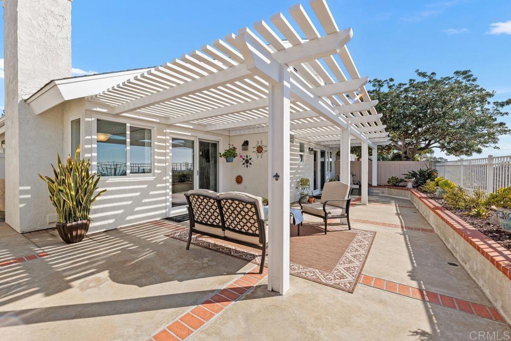6833 Watercourse Drive Carlsbad, CA 92011 - Photo 22 of 49 a view of a house with sitting area