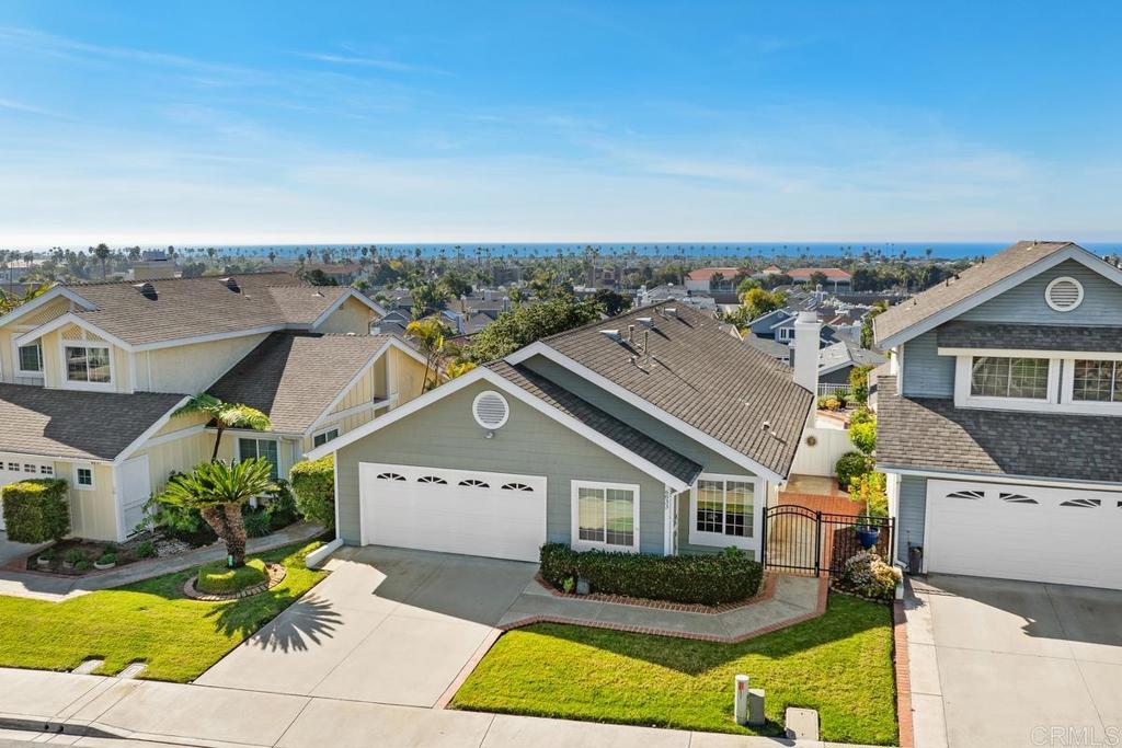6833 Watercourse Drive Carlsbad, CA 92011 - Photo 35 of 49 an aerial view of a house with a yard