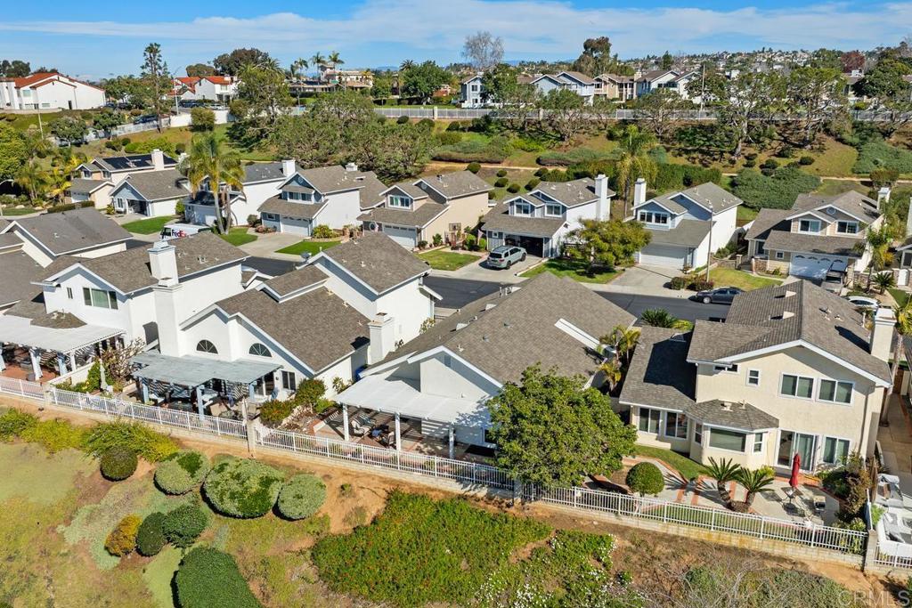 6833 Watercourse Drive Carlsbad, CA 92011 - Photo 39 of 49 an aerial view of residential houses with outdoor space