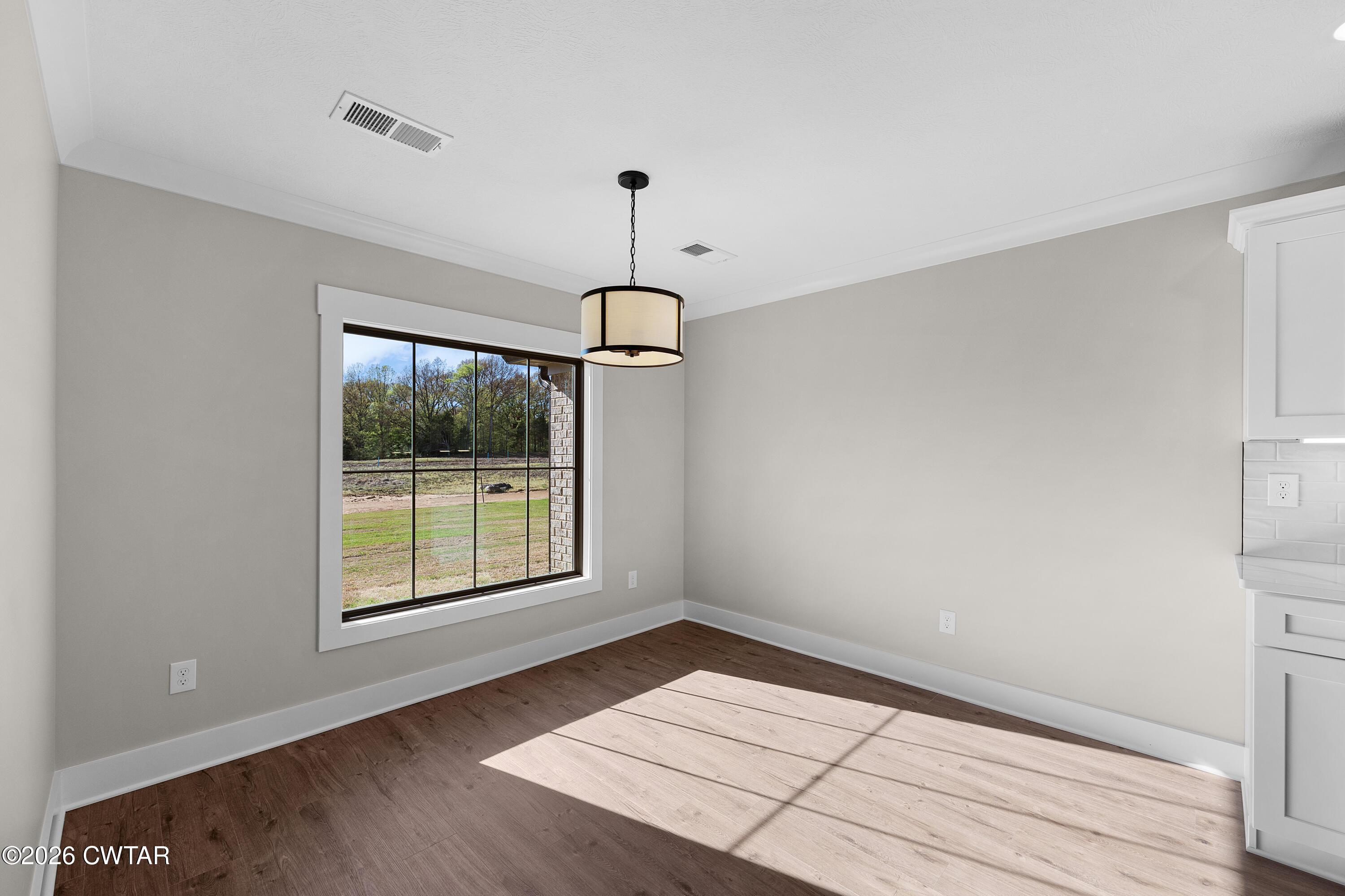 19 Emerald Downs Three Way, TN 38343 - Photo 7 of 17 a view of an empty room with a window