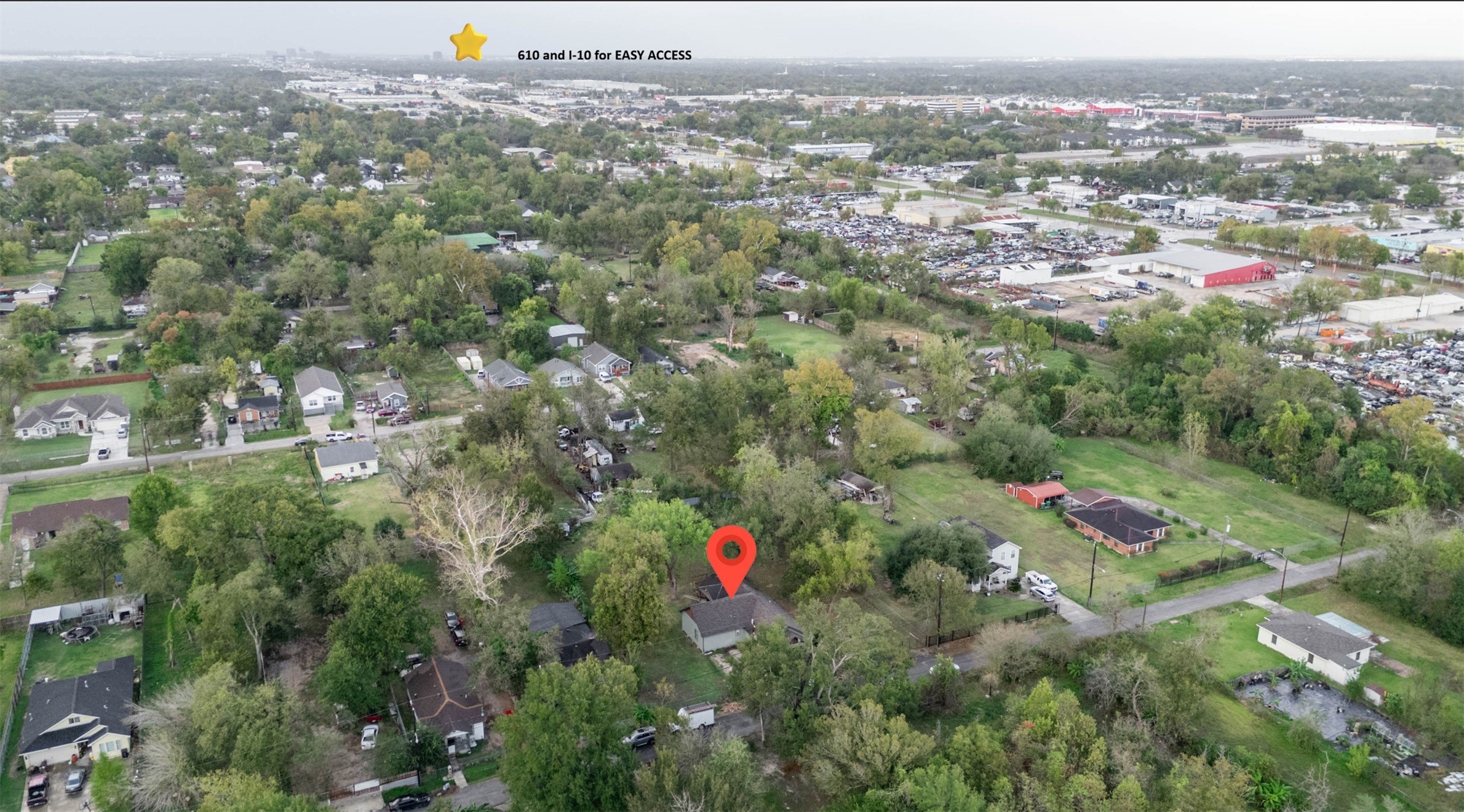 760 Homer Street Houston, TX 77091 - Photo 10 of 10 an aerial view of house with yard and mountain view in back