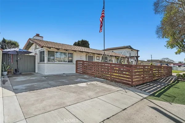 a front view of a house with a garage