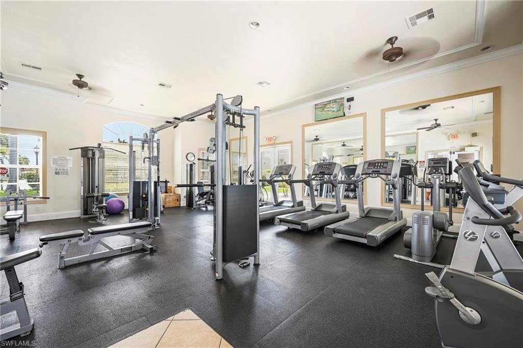 3916 Cherrybrook Loop Fort Myers, FL 33966 - Photo 31 of 31 Fitness center featuring extensive exercise equipment on black rubber flooring