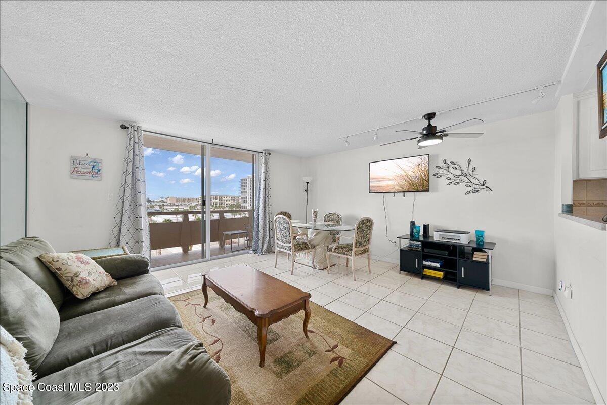 2020 North Atlantic Avenue, Unit 505 Cocoa Beach, FL 32931 - Photo 14 of 16 a living room with furniture