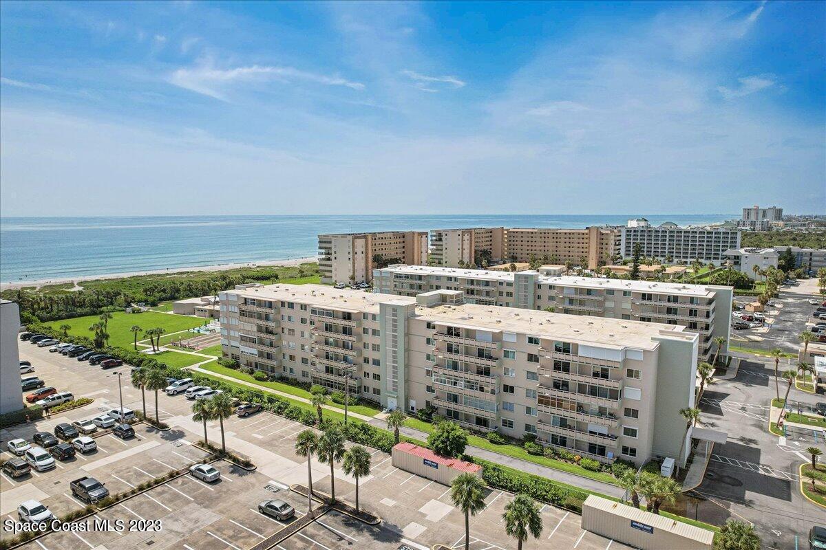 2020 North Atlantic Avenue, Unit 505 Cocoa Beach, FL 32931 - Photo 2 of 16 a view of a city with tall buildings