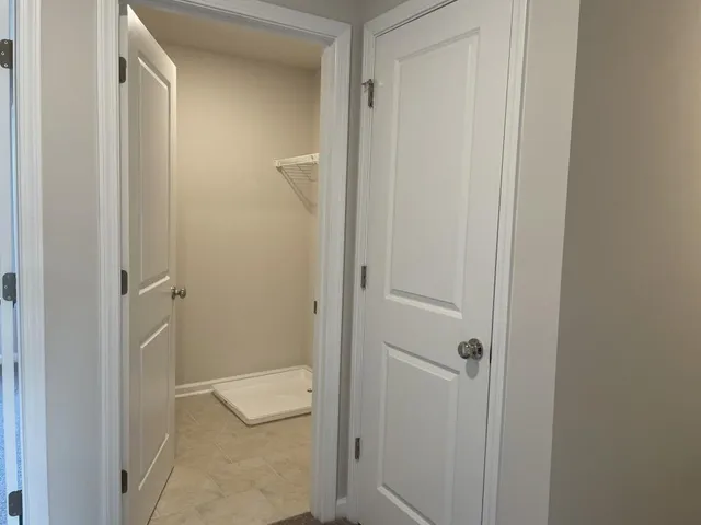 a bathroom with a granite countertop sink
