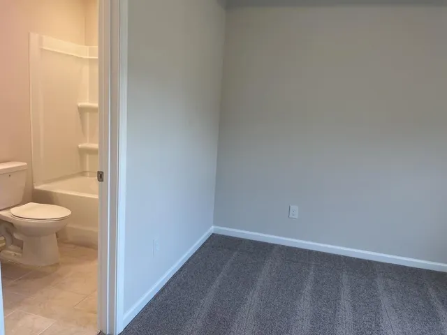 a bathroom with a toilet