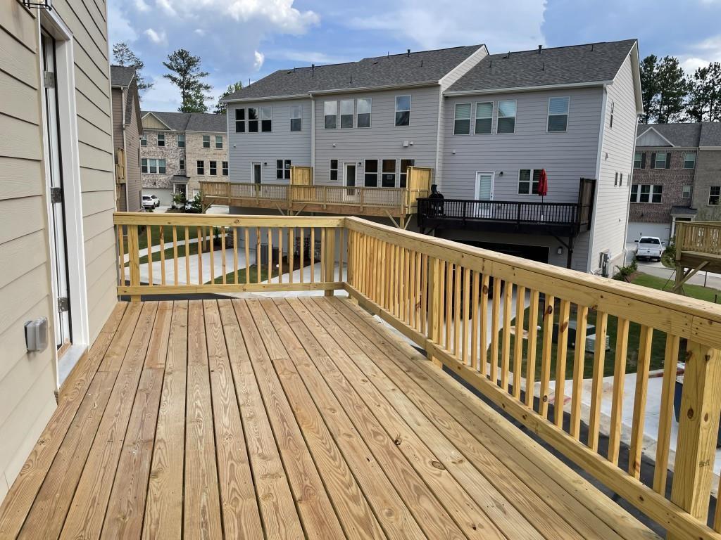 3400 Reagan Way Lawrenceville, GA 30044 - Photo 20 of 20 a view of a house with wooden deck