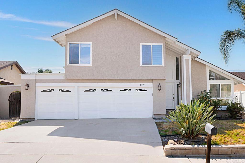 1917 Comanche Street Oceanside, CA 92056 - Photo 2 of 39 a view of a house with a backyard