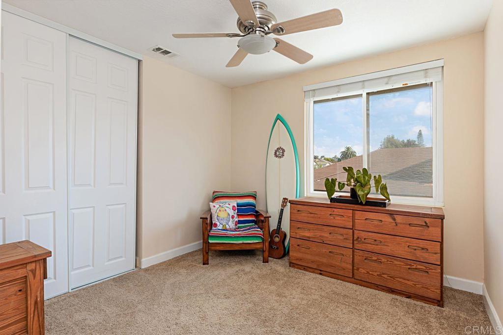 1917 Comanche Street Oceanside, CA 92056 - Photo 24 of 39 a living room with furniture and a window