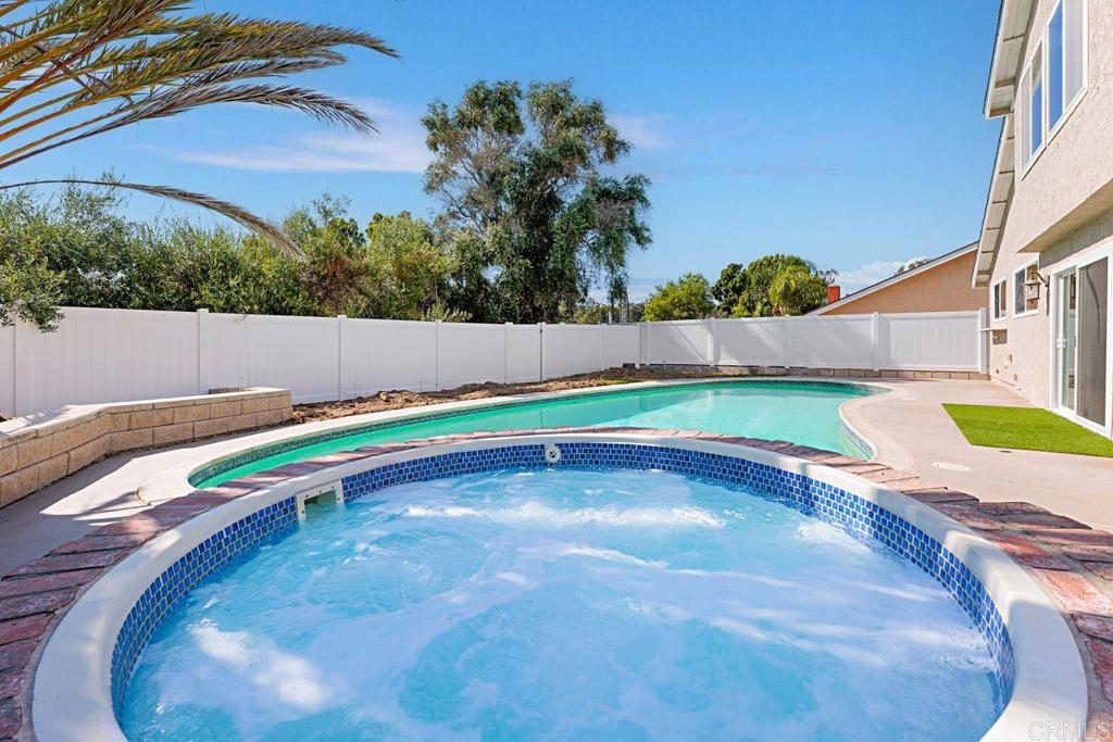 1917 Comanche Street Oceanside, CA 92056 - Photo 30 of 39 a view of a swimming pool with an outdoor space and seating area